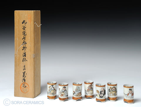 saki cups, shot glass shape, white with polychrome figures