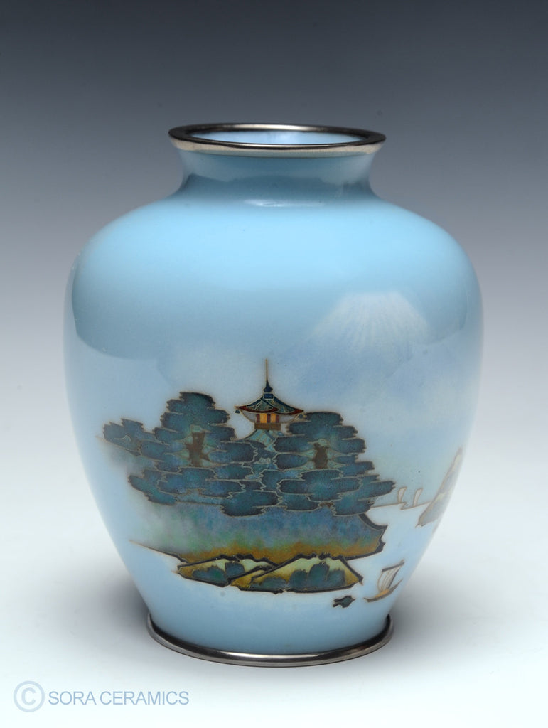 sky blue cloisonne vase with design