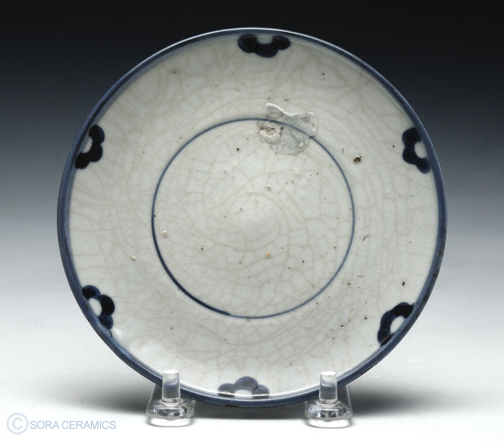Old Imari dish, simple white with blue rim, crackled glaze