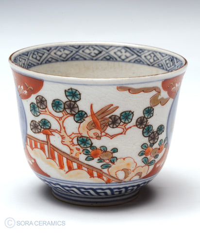 Imari choko cups, blue and white with polychrome designs