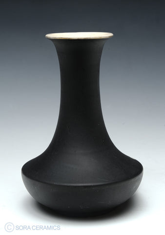 Satsuma vase, black matte finish, white interior and floral motifs