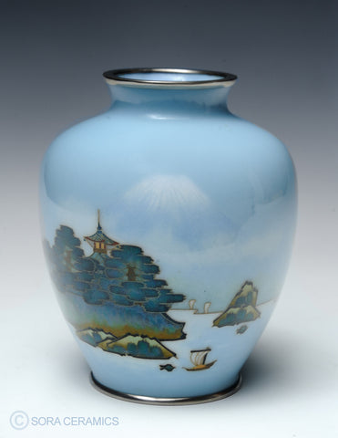 sky blue cloisonne vase with design