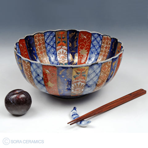 Imari bowls, reds, blues, persimmon, gold