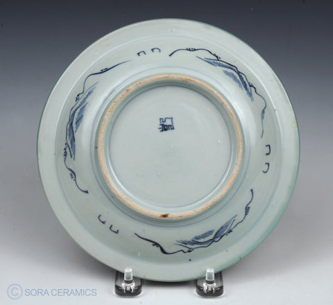 Imari plate, celadon rim, blue and white center