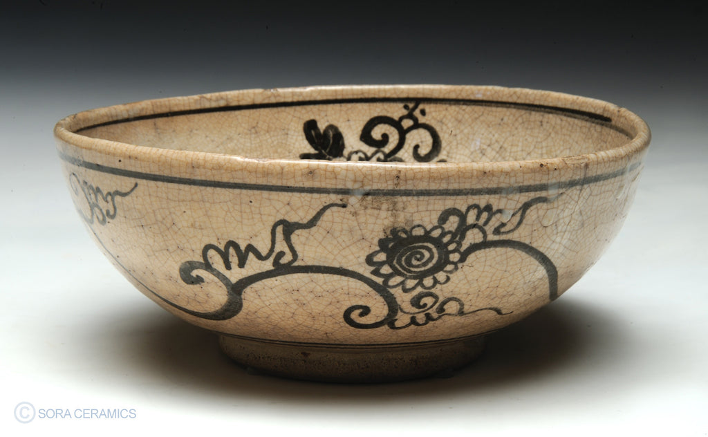 pottery bowl, cream with brown brushwork designs