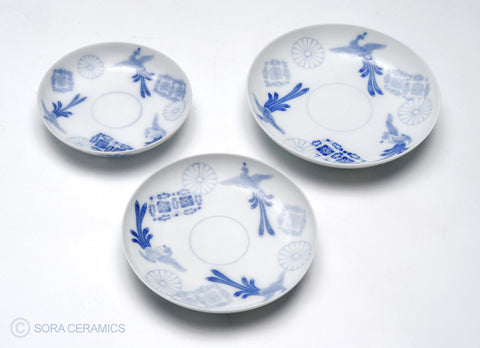 white plates with blue floral designs
